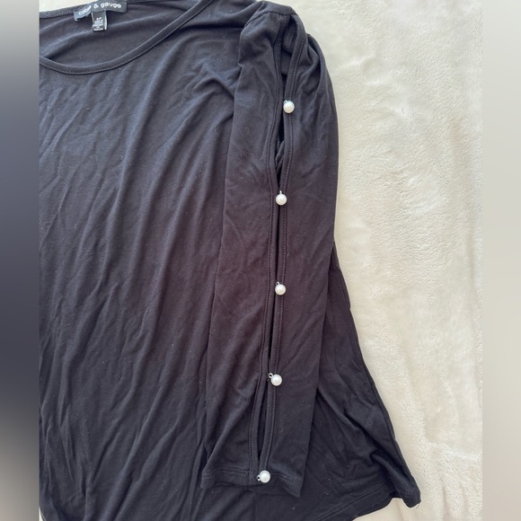 Cable & Gauge Black Shirt with Pearls on Cut Out Longsleeves
Like New
Size Small - Picture 6 of 7